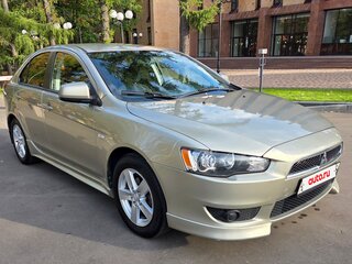 2008 Mitsubishi Lancer X, бежевый, 645000 рублей, вид 1
