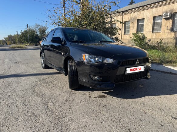 2008 Mitsubishi Lancer X, чёрный - вид 1