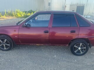 2011 Daewoo Nexia I Рестайлинг, пурпурный, 190000 рублей, вид 2