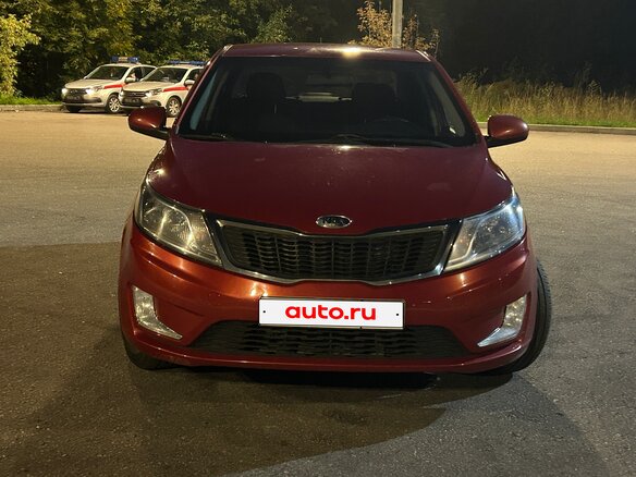 2012 Kia Rio 4-speed III, красный, 750000 рублей - вид 2