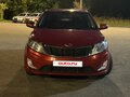 2012 Kia Rio 4-speed III, красный, 750000 рублей - вид 2