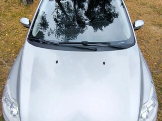 2009 Ford Focus II Рестайлинг, серебристый, 530000 рублей, вид 2