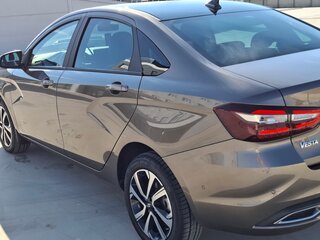 2024 Lada (ВАЗ) Vesta I Рестайлинг (NG), коричневый, 1490000 рублей, вид 4