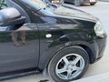 2011 Chevrolet Aveo I Рестайлинг, чёрный, 220000 рублей - вид 7