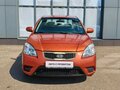 2010 Kia Rio II Рестайлинг, оранжевый - вид 1