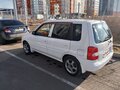 2001 Mazda Demio I (DW), белый - вид 2