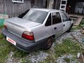 2002 Daewoo Nexia I, серый - вид 3