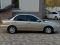 2007 Kia Spectra I Рестайлинг 2, бежевый - вид 3