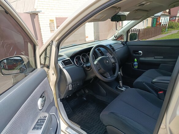 2010 Nissan Tiida I, коричневый - вид 9