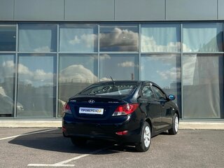 2011 Hyundai Solaris I, чёрный, 585000 рублей, вид 4