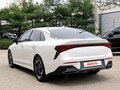 2023 Kia K5 III Рестайлинг, белый - вид 2