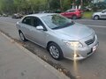 2008 Toyota Corolla AMT X (E140, E150), серебристый - вид 2