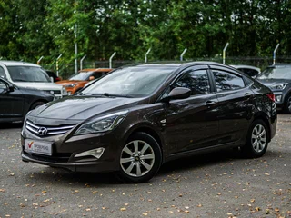 2014 Hyundai Solaris I Рестайлинг, коричневый, 875000 рублей, вид 1