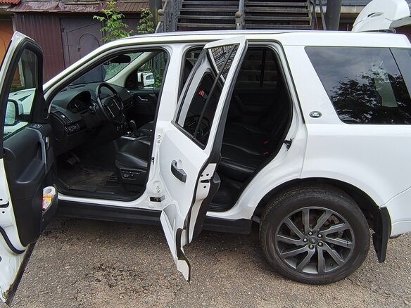 2011 Land Rover Freelander II Рестайлинг, белый - вид 3