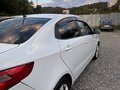 2012 Kia Rio 4-speed III, белый, 650000 рублей - вид 6