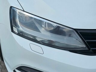 2016 Volkswagen Jetta VI Рестайлинг, белый, 881000 рублей, вид 4