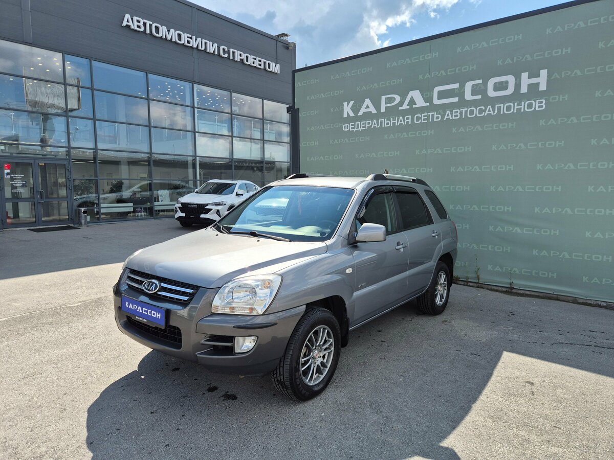 Открыть фотографии: Kia Sportage II