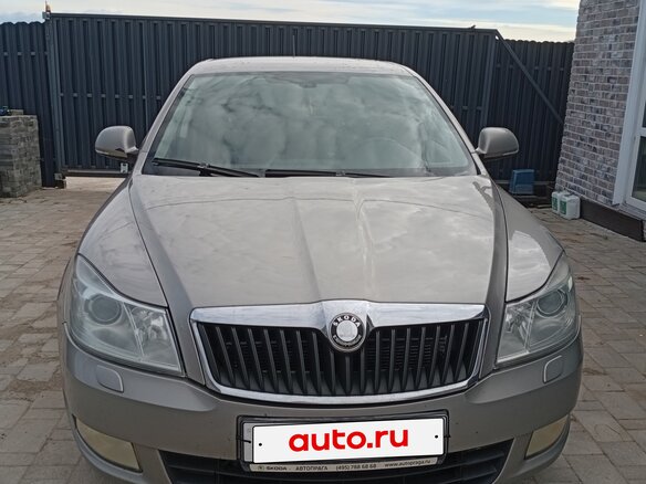 2012 Skoda Octavia II (A5) Рестайлинг, бежевый - вид 1