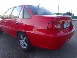 2012 Daewoo Nexia I Рестайлинг, красный, 65000 рублей, вид 4