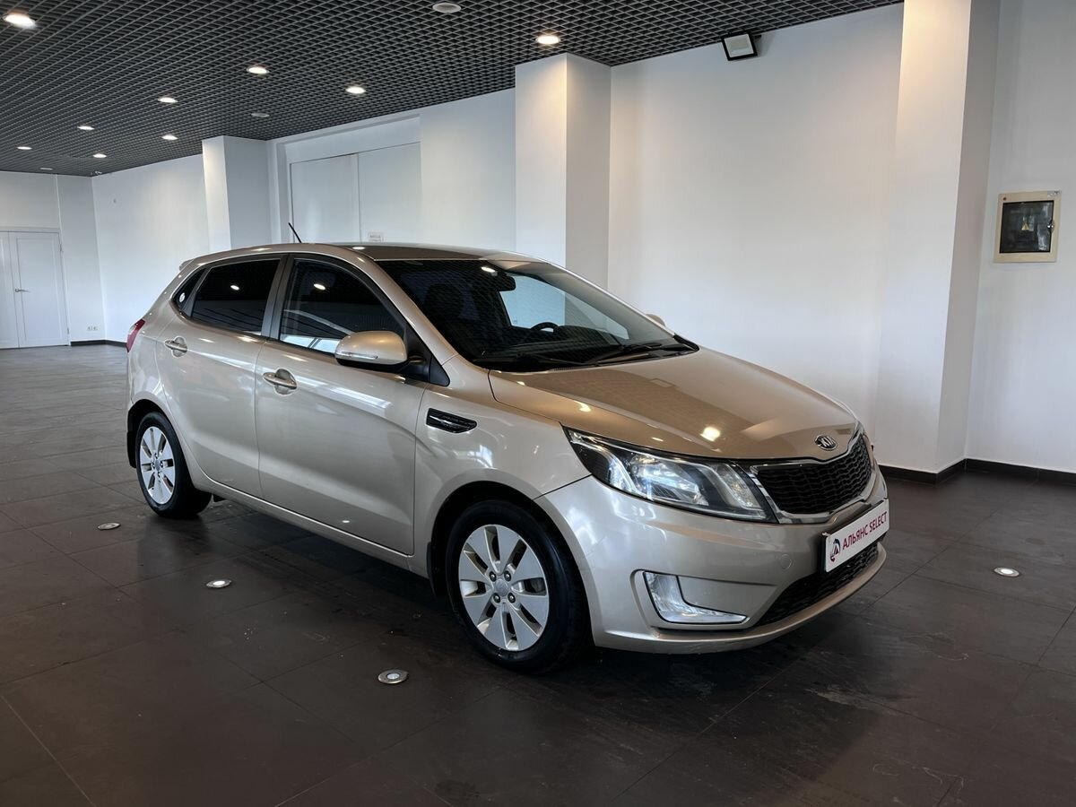 Открыть фотографии: Kia Rio III