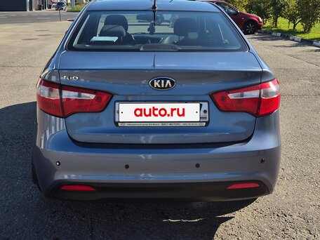 2013 Kia Rio 5-speed III, голубой, 825000 рублей, вид 3