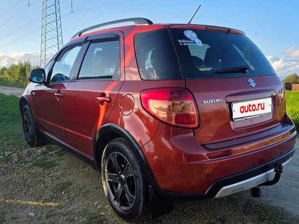 2010 Suzuki SX4 I (Classic) Рестайлинг, оранжевый, 645000 рублей - вид 10