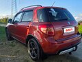 2010 Suzuki SX4 I (Classic) Рестайлинг, оранжевый, 645000 рублей - вид 10