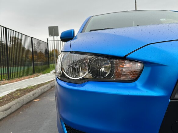 2010 Mitsubishi Lancer X, синий - вид 14