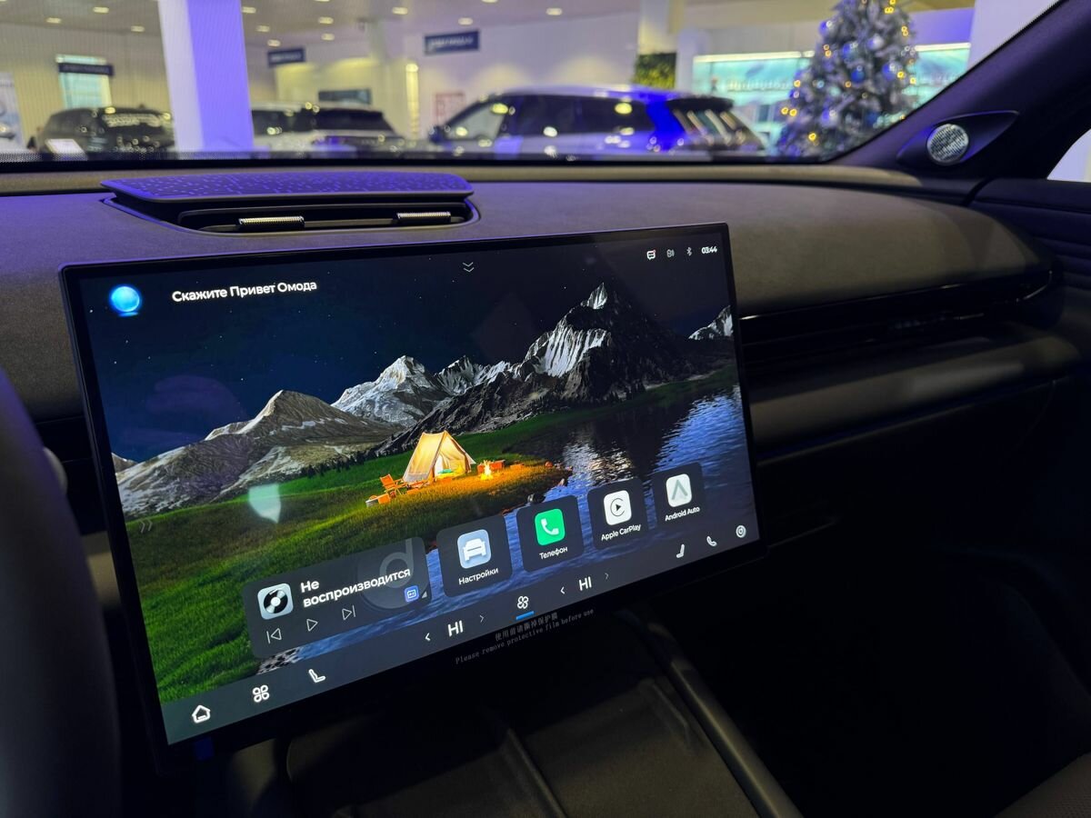 Открыть фотографии: Omoda C7