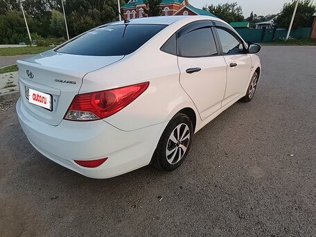 2011 Hyundai Solaris I, белый, 620000 рублей, вид 3