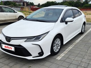 2021 Toyota Corolla XII (E210), белый, 1730000 рублей, вид 2
