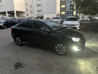 2011 Kia Rio 4-speed III, чёрный, 579000 рублей, вид 1