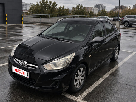 2012 Hyundai Solaris I, чёрный, 649000 рублей, вид 1