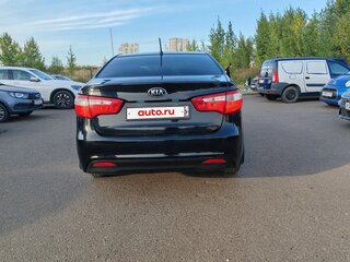 2014 Kia Rio 5-speed III, чёрный, 795000 рублей, вид 5