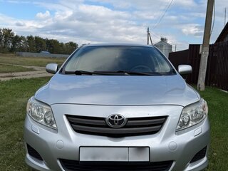 2009 Toyota Corolla X (E140, E150), серебристый, 950000 рублей, вид 1