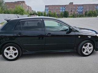 2005 Toyota Corolla Runx IX (E120, E130) Рестайлинг, чёрный, 750000 рублей, вид 3