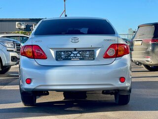 2008 Toyota Corolla X (E140, E150), голубой, 650000 рублей, вид 4