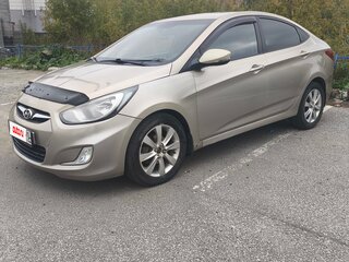 2011 Hyundai Solaris I, бежевый, 590000 рублей, вид 1