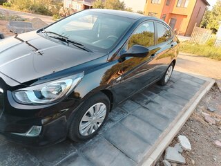 2011 Hyundai Solaris I, чёрный, 700000 рублей, вид 1