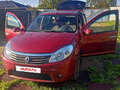 2011 Renault Sandero I, пурпурный, 550000 рублей - вид 1