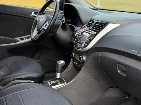 2011 Hyundai Solaris I, красный - вид 15