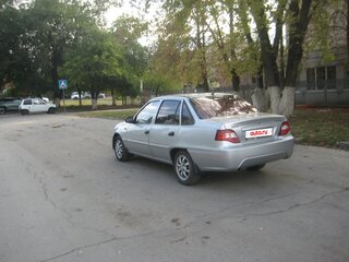 2011 Daewoo Nexia I Рестайлинг, серебристый, 210000 рублей, вид 4