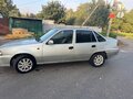 2008 Daewoo Nexia I Рестайлинг, серебристый, 140000 рублей - вид 3