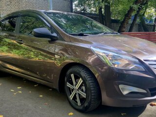 2016 Hyundai Solaris I Рестайлинг, коричневый, 880000 рублей, вид 2