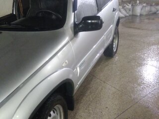 2010 Chevrolet Niva I Рестайлинг, серебристый, 550000 рублей, вид 3