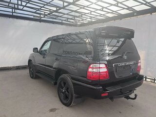 2004 Toyota Land Cruiser 100 Series Рестайлинг 1, чёрный, 1898000 рублей, вид 3