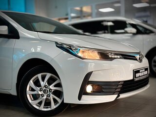 2018 Toyota Corolla XI (E160, E170, E180) Рестайлинг 1, белый, 1899000 рублей, вид 2