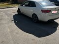 2009 Kia Cerato 5-speed II, белый, 460000 рублей - вид 2