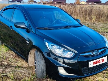 2014 Hyundai Solaris I, чёрный, 730000 рублей, вид 2