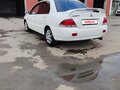 2006 Mitsubishi Lancer IX Рестайлинг, белый, 315000 рублей - вид 8